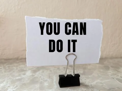 You Can Do It message written on ripped torn paper background. Conceptual Y.. Foto stock