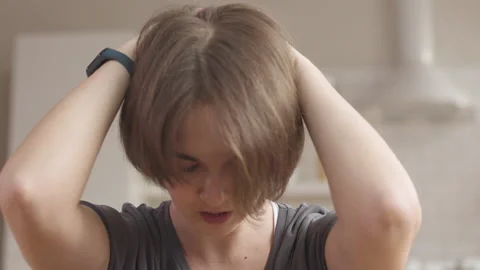 You can do it! Young Woman Doing Core Workout Stock Footage 153086388