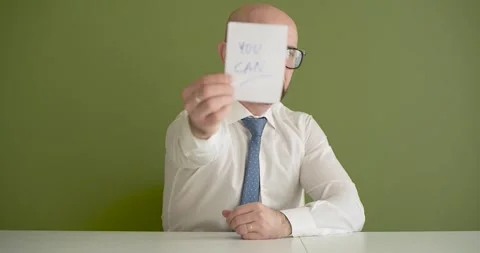 You Can - A man presents a note with the word Stock Footage 267088652