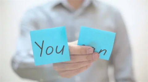 You can. A man sticks a note on transparent screen Stock Footage 68088691