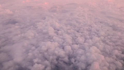You can see the clouds from the height of a flying airplane. Video stock 119036317