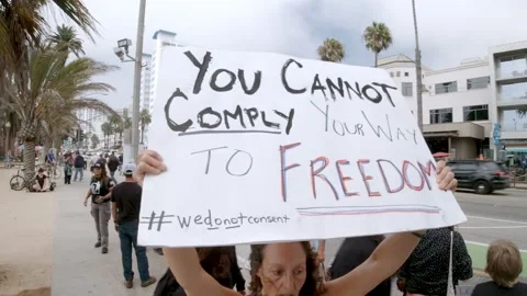 You Cannot Comply Your Way To Freedom - Vaccine Protester Stock Footage 159772476