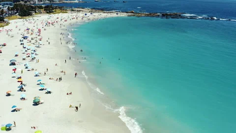 You cant visit Cape Town without seeing Camps Bay. 4k drone footage of Stock Footage 201118772