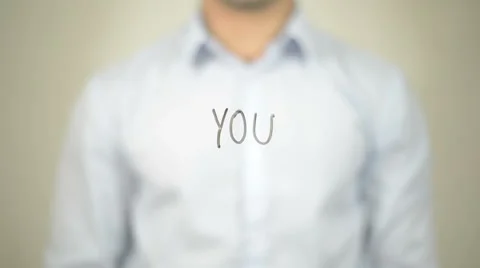 You,  Man writing on transparent screen 動画素材 62989920