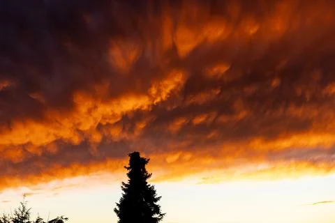 You might think the clouds are glowing Stock Photos