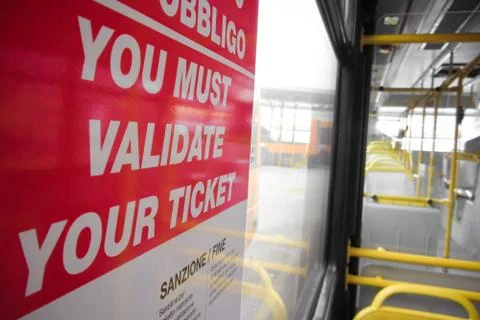 You must validate your ticket on city bus Stock Photos