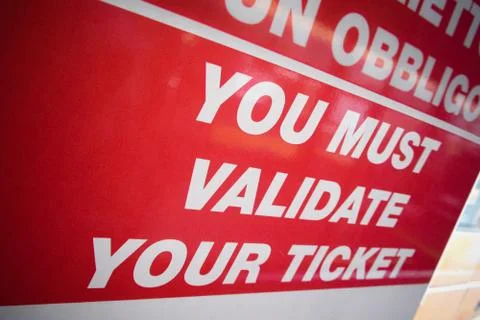 You must validate your ticket on city bus Stock Photos