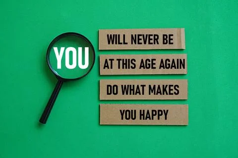 YOU WILL NEVER BE AT THIS AGE AGAIN DO WHAT MAKES YOU HAPPY. Motivational quote Stock Photos