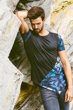 Youn man posing outside Stock Photos