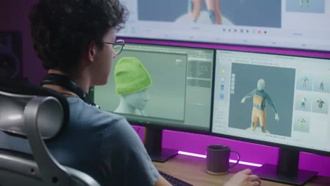 Young 3D designer creates clothes on PC using professional software Stock Footage 244453837