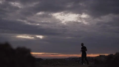 Young active man running and exercising during morning outdoor workout Stock Footage 149392499