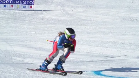Young active professional skiers skiing Stock Footage 87185899