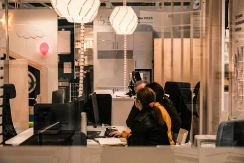 Young active talented architects discussing a project, team work, discussion. Stock Photos