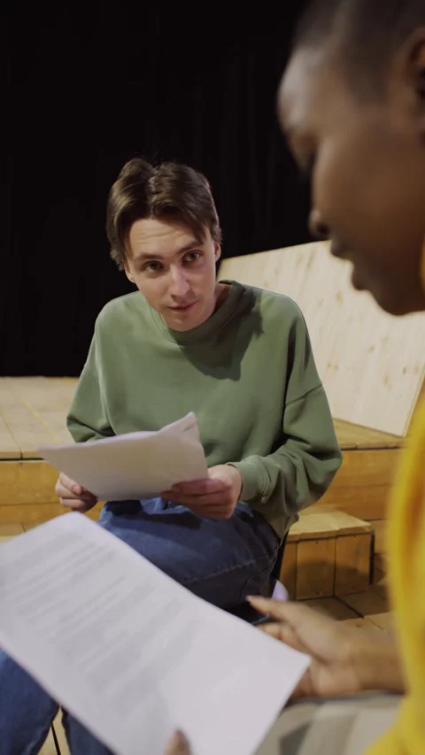 Young Actor Learning Play Script with Female Partner on Theatre Rehearsal Stock Footage 278971690