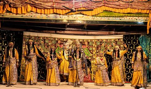 Young actor representing krishna and radha marriage on stage. Stock Photos