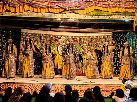 Young actor representing krishna and radha marriage on stage. Stock Photos