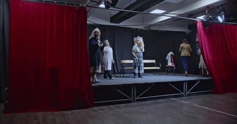 Young Actors Rehearse on Stage, Preparing for a Theater Performance in Costumes Stock Footage 312058374