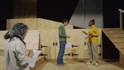 Young Actress and Actor Practicing Emotional Dialogue on Theatre Stage Stock Footage 279592579