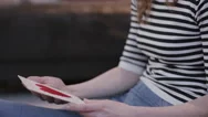 Young Adult Female Opening Valentine's Day Card At Home Stock Footage