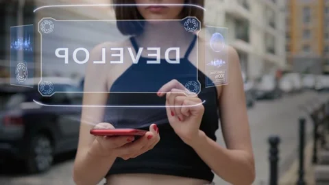 Young adult interacts hologram Develop Stock Footage 144592231