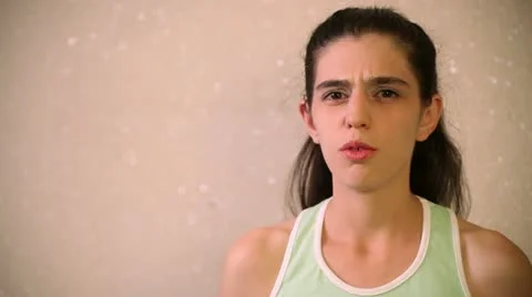 Young Adult Woman Nods Her Head Stock Footage