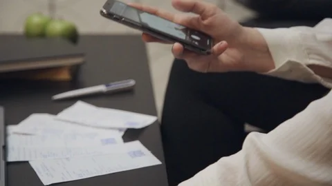 Young adult woman using code scan on smartphone Stock Footage 119472932