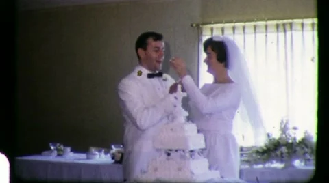 Young Adults Hip BRIDE GROOM Cut Wedding Cake 1960s Vintage Film Home Movie 3324 Stock Footage