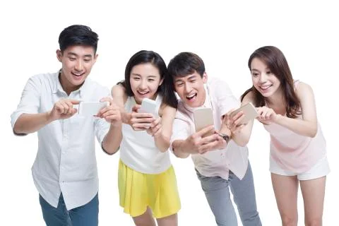 Young adults using smart phones Foto stock
