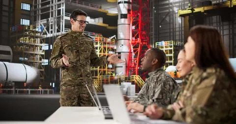 Young Aerospace Engineer Giving Presentation On Rocket Construction Technique Foto stock