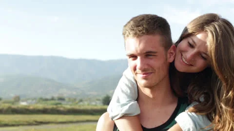 Young Affectionate Couple Outdoors Stock Footage 24791669