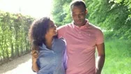 Young African American Couple Walking In Countryside Stock Footage