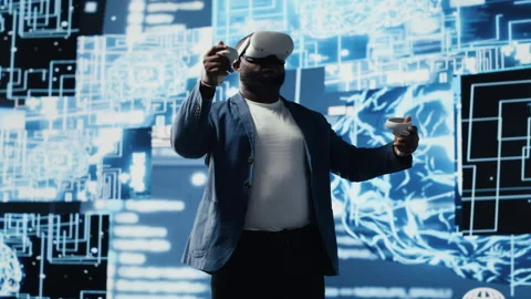 Young african american engineer focused on VR headset programming Stock Footage 312305500
