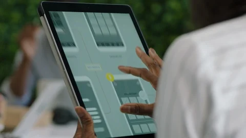 Young african american engineers developing mobile software application using Video stock 96834851