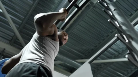 Young African American Man Performs Squat Exercises at Gym Stock Footage 98797468