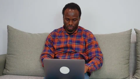 Young african american man software developer programming codes while working Stock Footage 268277293