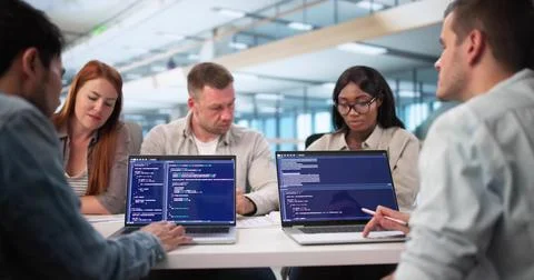 Young African American Software Engineer Typing Code On Laptop Screen. Stockfoto's