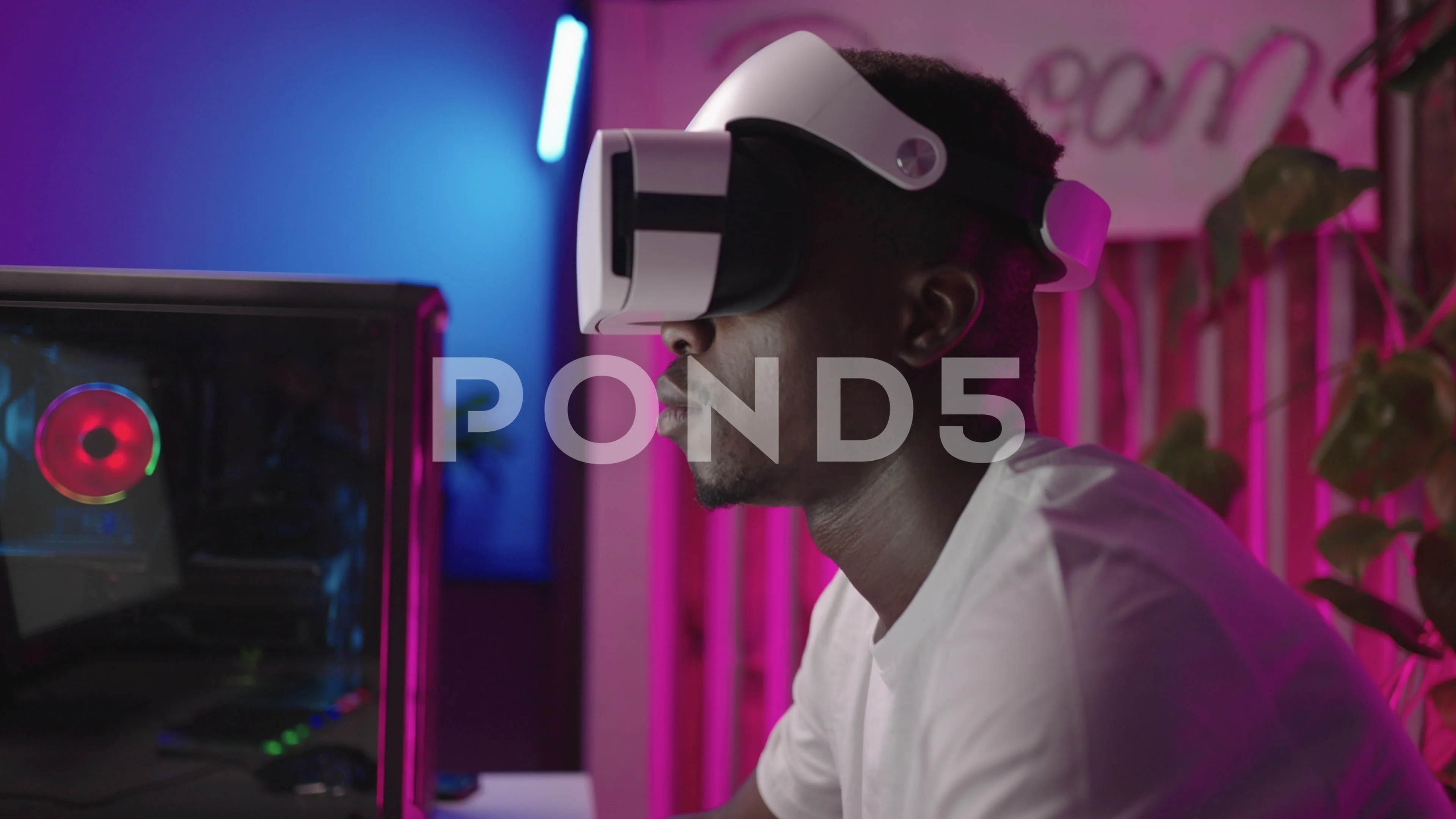 Young African American Video Gamer With VR Headset Playing Computer Games  Online