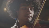 Young African American Violin Player Performing On Stage Stock Footage