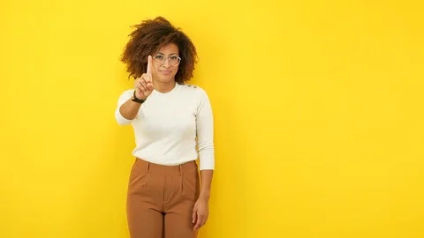Young african american woman showing number one Stock Footage