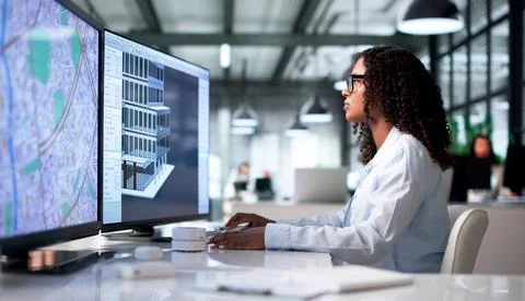 Young African Architect Uses Computer To Model Urban Building Plans Digitally Stock Photos
