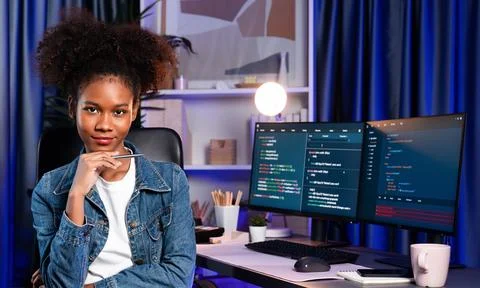 Young African IT developer presenting program and focus on camera. Tastemaker. 스톡 사진