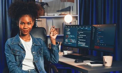 Young African IT developer presenting program and focus on camera. Tastemaker. 스톡 사진