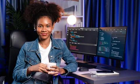 Young African IT developer presenting program and focus on camera. Tastemaker. 스톡 사진