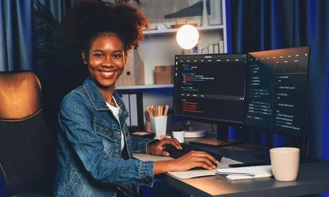 Young African IT developer presenting program and focus on camera. Tastemaker. 스톡 사진