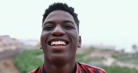 Young african man smiling on camera Stock Footage 164378569