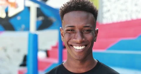 Young african man smiling on camera outdoor Stock Footage 183009238