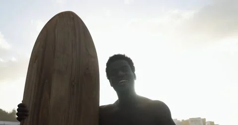 Young african surfer man smiling in camera Vídeo Stock 151685186
