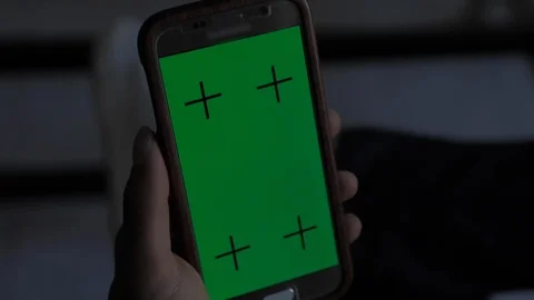 Young afro american man using his smartphone mock-up green screen in his living Stock-Footage 110772174