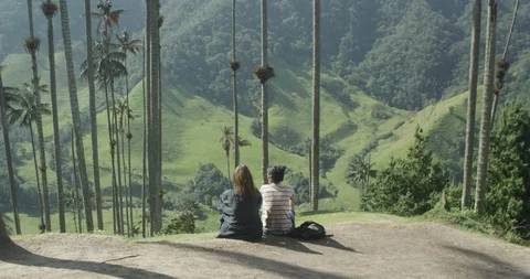 Young alternative girls having fun in tropical valley Stock Footage 86151432