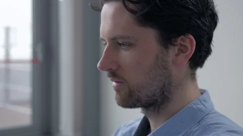 Young ambitious entrepreneur working on a computer in a new office. Video stock 82225209